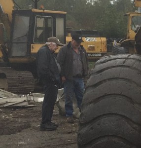 Ralph Wise of Premium Equipment Sales Ltd. with a heavy equipment trader